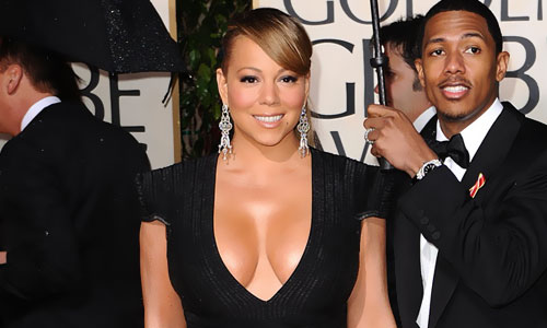 mariah carey's huge breasts are almost showing